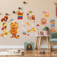 Vue sticker sur mur rose avec table et fauteuil sticker Garfield le film